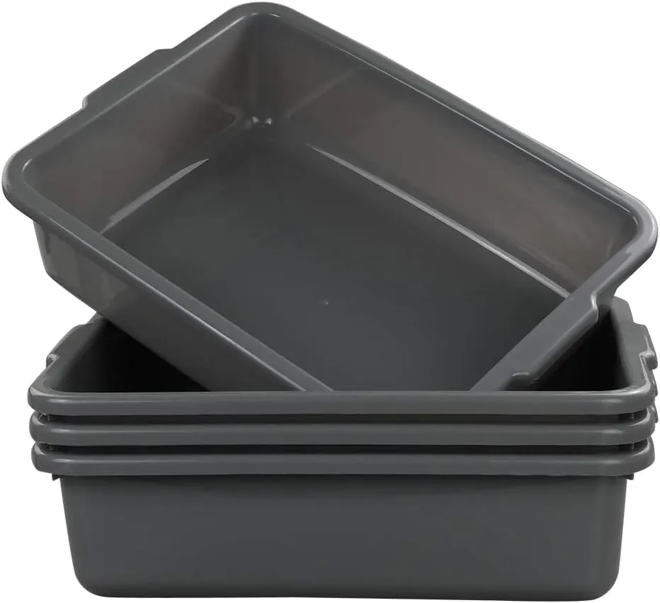 A stack of 4 grey plastic bus bins