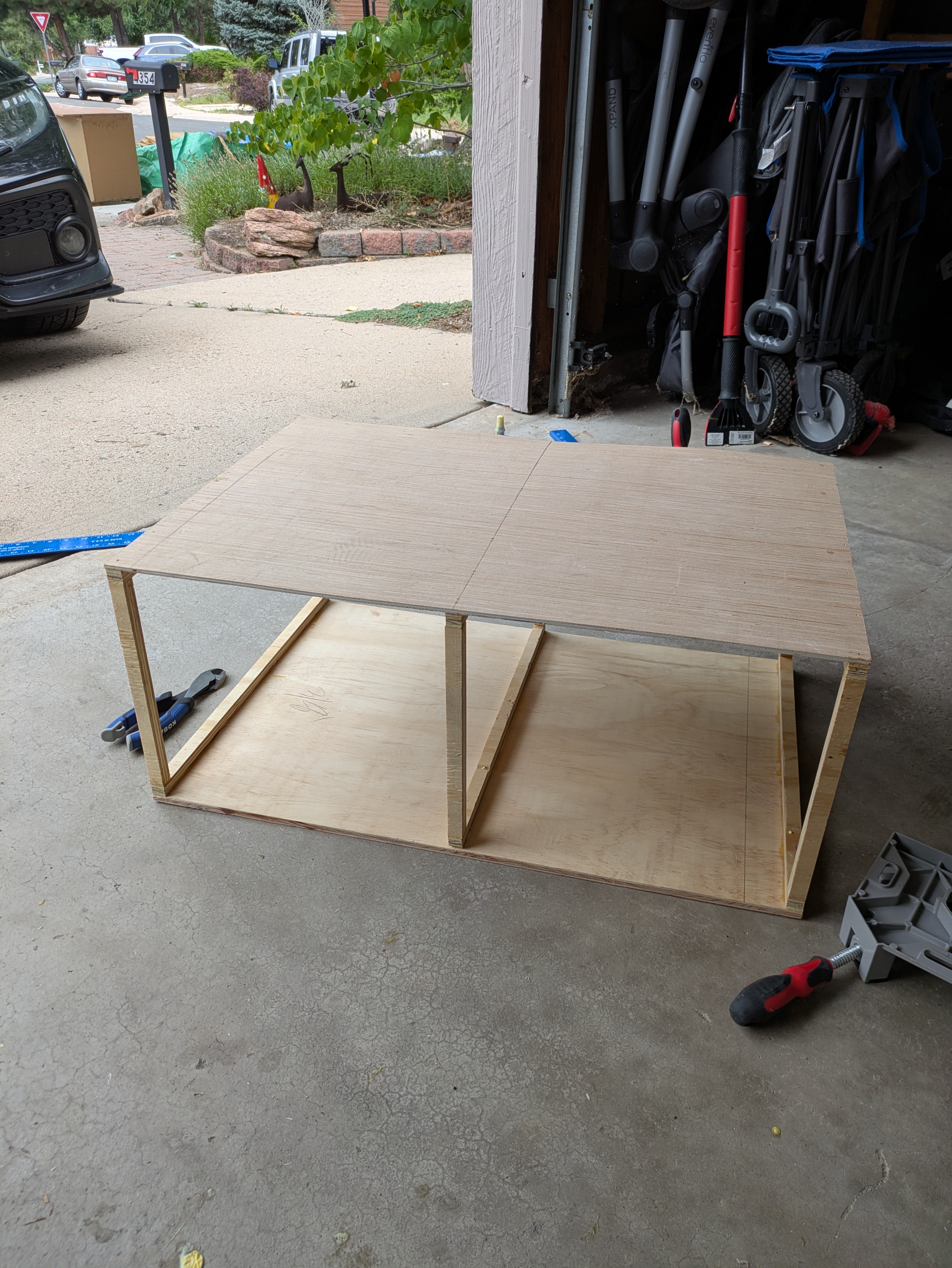 A box with no sides created with plywood strip rectangles and thin plywood