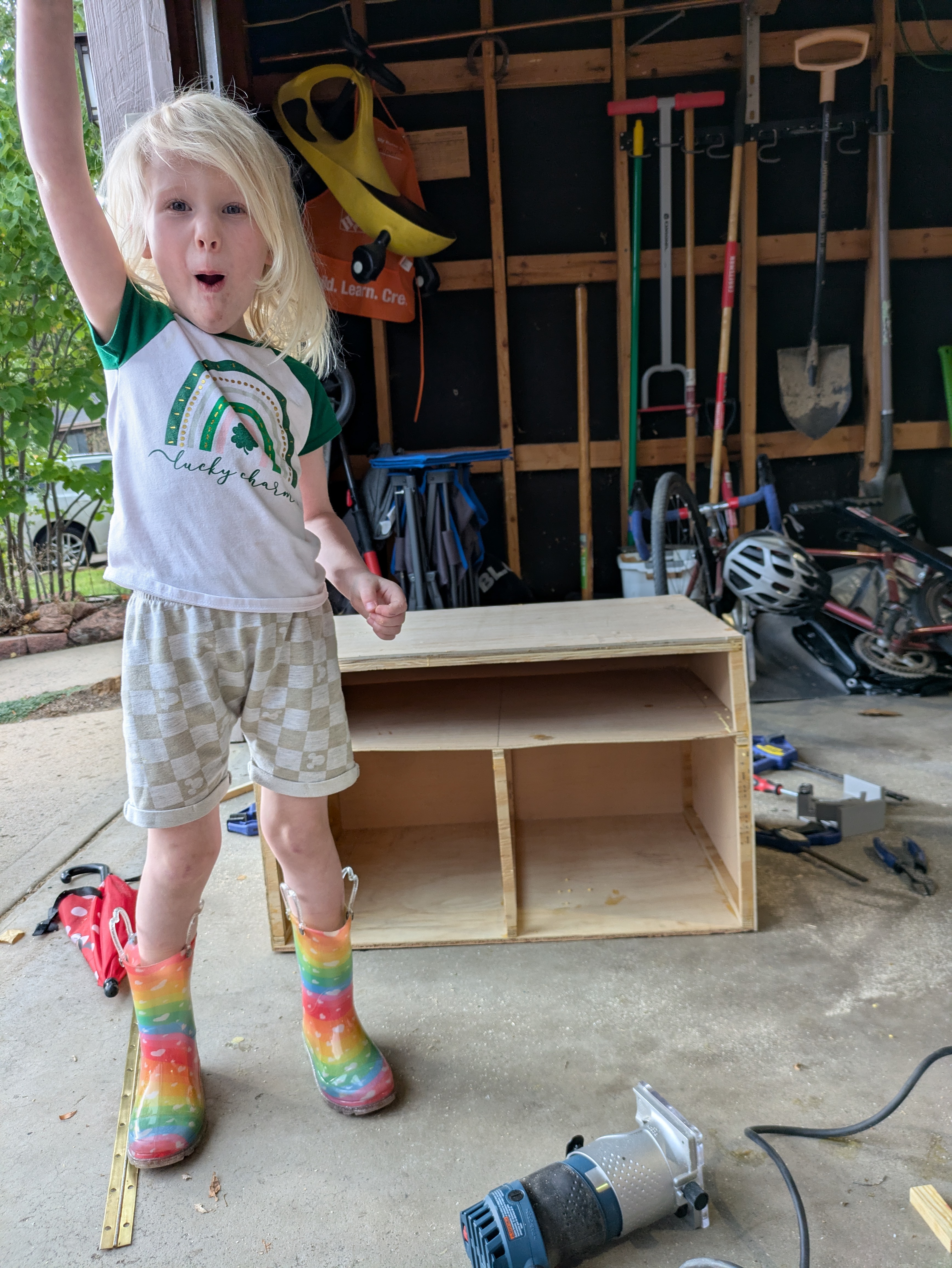 A box with no front created with plywood strips and thin plywood.